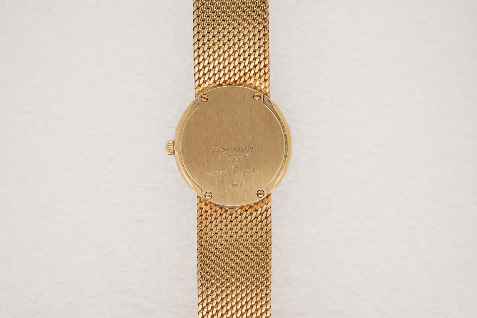 A lady's late 20th century Swiss Movado Museum 14k yellow metal quartz wrist watch, on an integral Italian 14k bracelet